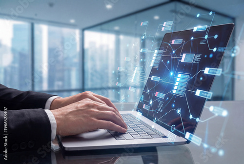 Professional hands in a suit type on a laptop keyboard displaying a complex digital network of glowing blue data nodes in a modern office.