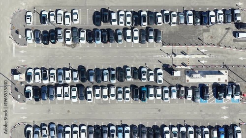 Public parking lot with Cars searching for parking spots