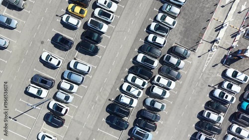 Public parking lot with Cars searching for parking spots