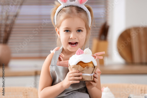 Cute little girl in bunny e...