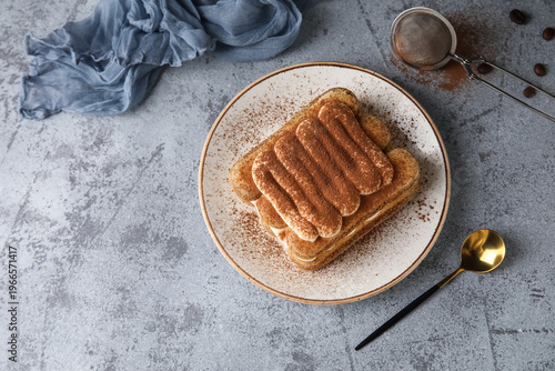 Plate with sweet tiramisu a...
