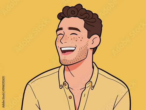 Young man smiles widely with curly hair and freckles against a bright yellow background during daytime