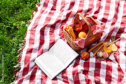 Plaid with wicker basket, b...