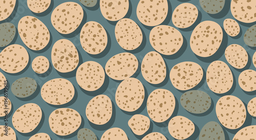 Seamless pattern featuring speckled oval shapes resembling pebbles or eggs in beige and grey colors on a dark teal background.