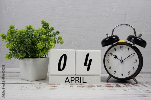 Wooden Calendar Showing the Date of April 4th. Day 4 of April month