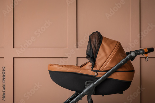 Modern baby stroller near b...