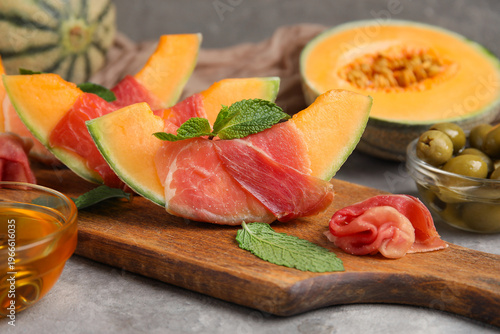 Wooden board of fresh melon...