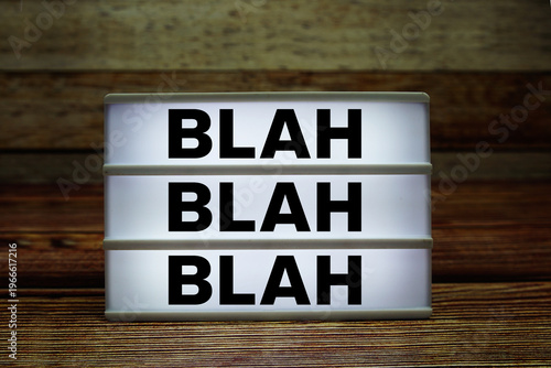 Photos Lightbox with text Blah Blah Blah on wooden background