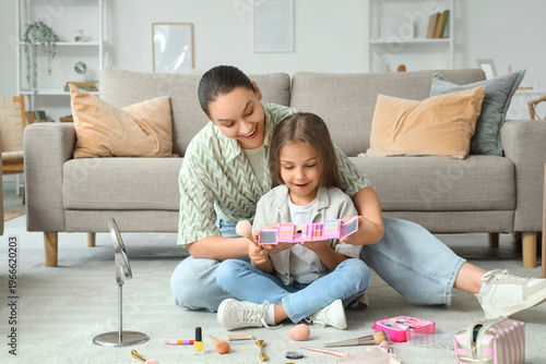 Happy young woman and her d...