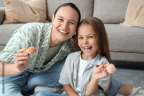 Happy young woman and her d...