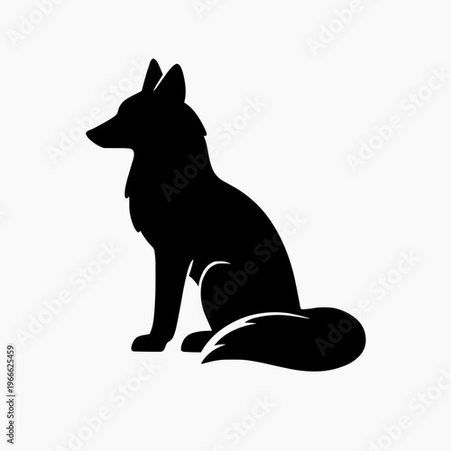 A striking silhouette of a fox in a seated position