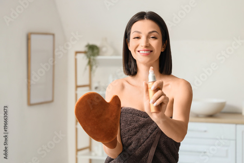 Happy young woman with mass...