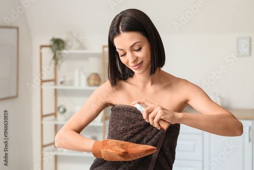 Young woman with massage gl...
