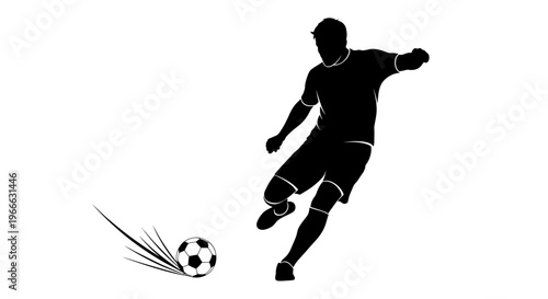 Soccer player kicking a ball dynamic action captured in silhouette