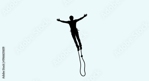 A person with arms outstretched appears to be jumping with a rope silhouette