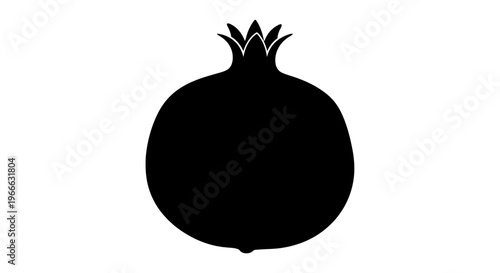 A striking black silhouette of a ripe pomegranate fruit
