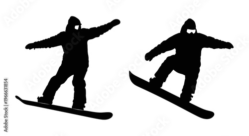 Two snowboarders in dynamic poses captured as a stark silhouette