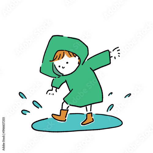 レインコートを着て水たまりで遊ぶ子ども