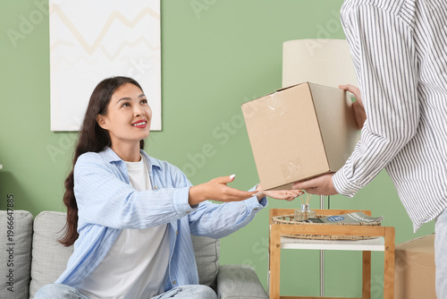 Young Asian woman taking pa...