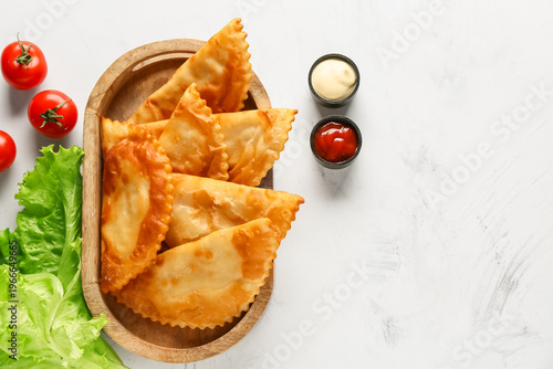 Wooden basket with tasty ch...