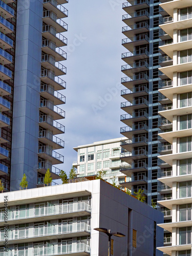 New high rise residential buildings on overcast sky background