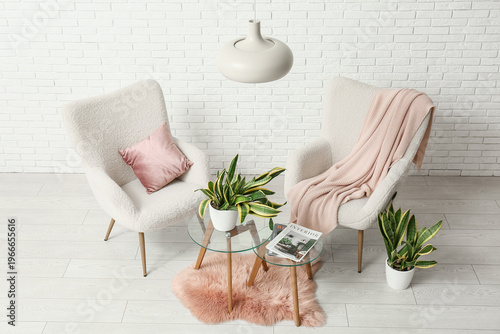 Armchairs, tables and sanse...