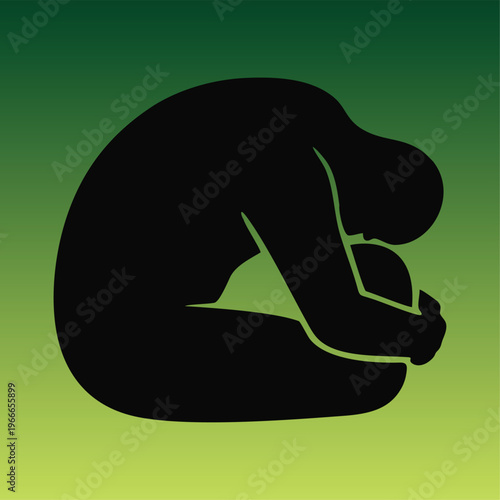Silhouette of a person in fetal position against a green gradient background representing depression, sadness, and mental health awareness.
