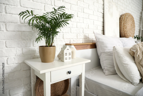 Bedside table with housepla...