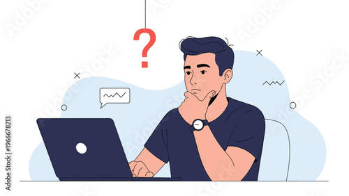 Young man in a blue shirt sitting at his desk and looking confused while working on his laptop with a large red question mark above his head.