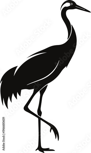 Black silhouette of a crane standing on one leg isolated on white background