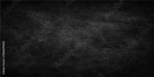 A dark, textural field of weathered chalkboard, revealing subtle gradations of tone and intricate textures.