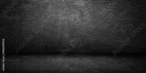 Empty dark grunge room with a black vintage concrete wall and textured gray cement floor surface creating a blank old backdrop