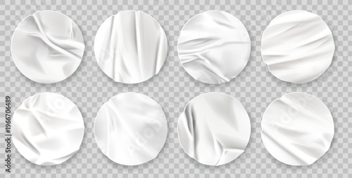 Round paper label sticker set with realistic crumpled texture and adhesive tape effect. White circular badges with glued edges, vintage fold shadows and blank templates for mockup designs.