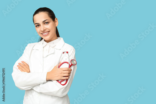Portrait of female doctor w...