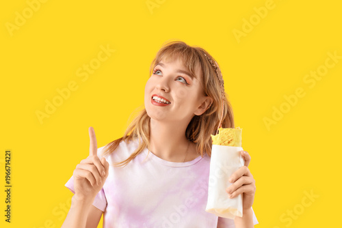 Young woman with tasty sand...