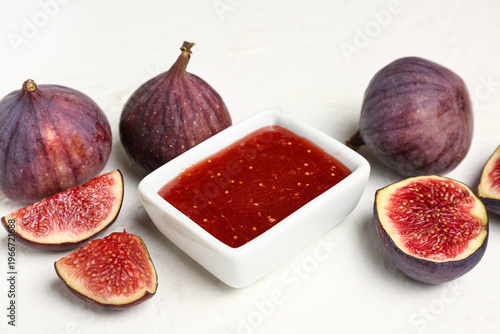 Bowl of sweet fig jam on wh...