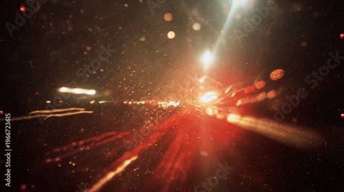 1990s retro flash photograph on Super 8 camera, red light through airplane window at night, sky lights with motion blur, dust and scratches texture, vintage film aesthetic from slow shutter speed