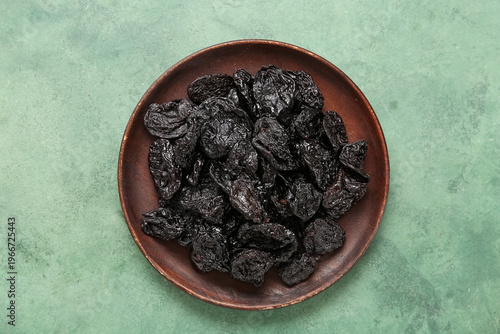 Plate with tasty dried plum...
