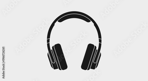 A sleek black illustration of headphones on a plain background shows technology.