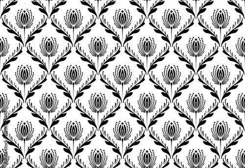 Wallpaper in the style of Baroque. White and black floral ornament. Seamless vector background. Graphic pattern for fabric, wallpaper, packaging. Ornate Damask flower illustration.