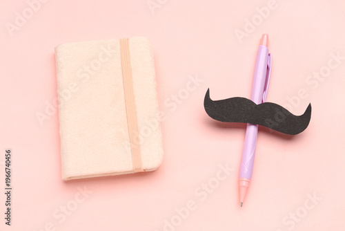Notebook and pen with paper...