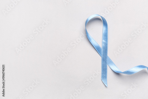 Blue satin ribbon on light ...