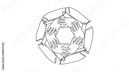 Diverse group of people joining hands in unity and cooperation.