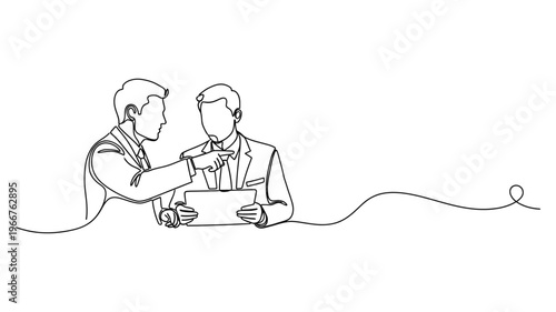 Two businessmen shaking hands in agreement.