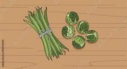 A bundle of green beans and Brussels sprouts on a wooden surface