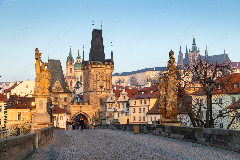 Fototapeta premium charles Bridge in Prague Czech Republic at sunrise with historic statues