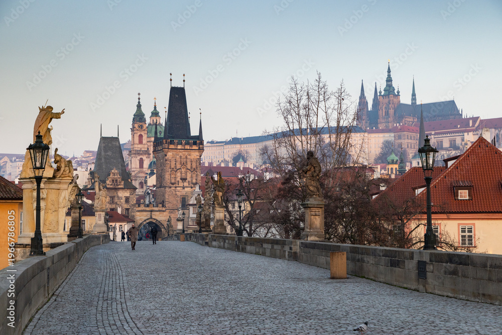Fototapeta premium charles Bridge in Prague Czech Republic at sunrise with historic statues