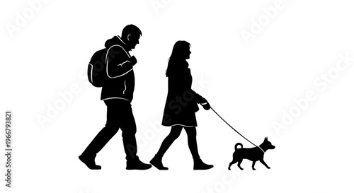 Silhouettes of a man and woman walking a dog on a leash