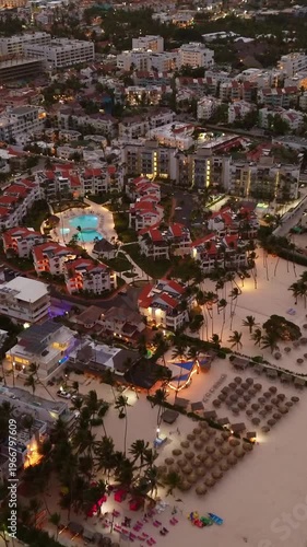 Popular tourist coastline at dusk, city lights