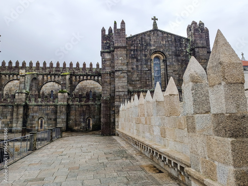 Robust facade in the upper courtyard of Porto Cathedral and crenellated wall, PORTUGAL